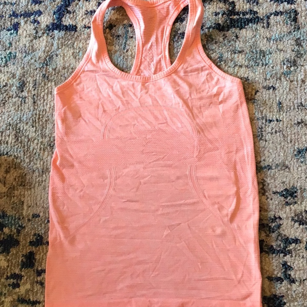 Pink lululemon swiftly tank top